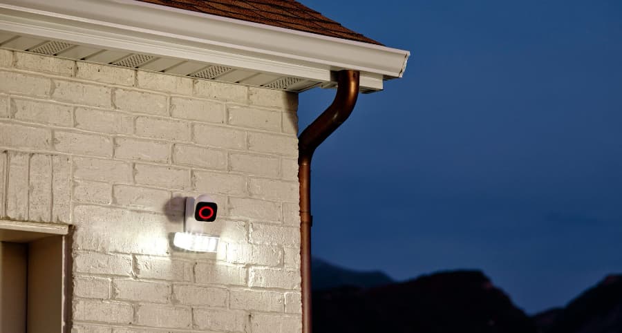 Vivint Spotlight Pro outdoor camera attached next to a garage